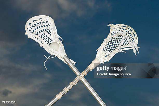 lacrosse sticks - lacrosse stick stock pictures, royalty-free photos & images