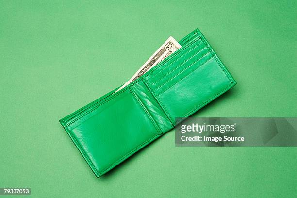 a green wallet - wallet stockfoto's en -beelden