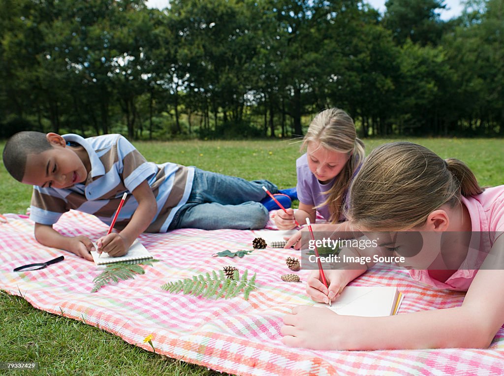 Kids drawing on field trip