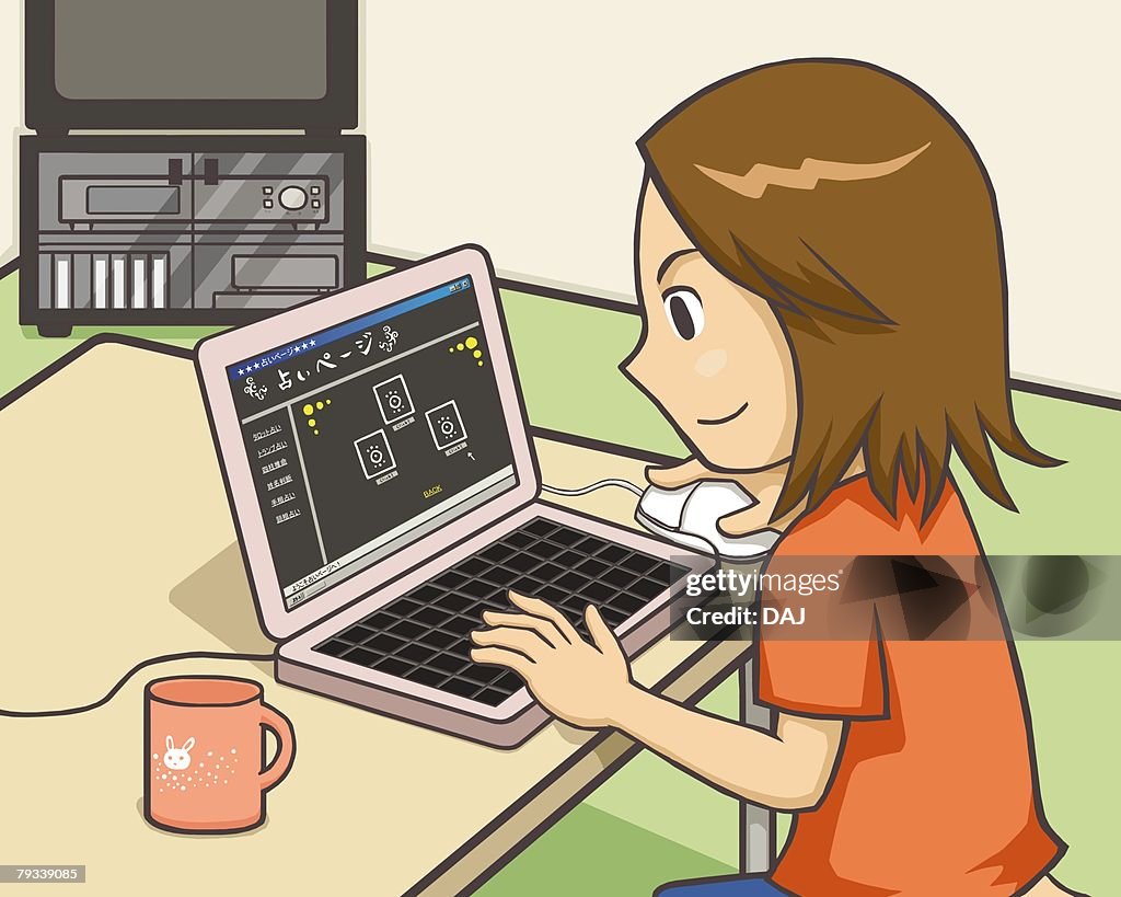 Woman using laptop, side view