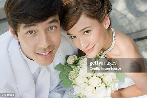 newlywed couple - asian bride stock pictures, royalty-free photos & images