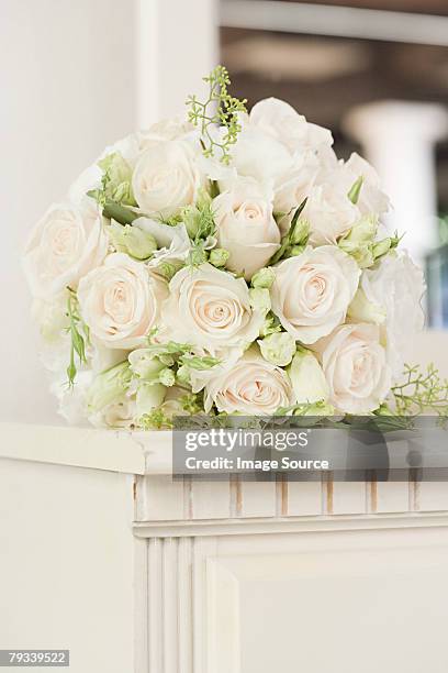 roses on a mantelpiece - rosa mantel stock pictures, royalty-free photos & images