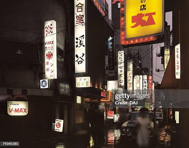 a street of shinjuku in the night - showa period fotografías e imágenes de stock