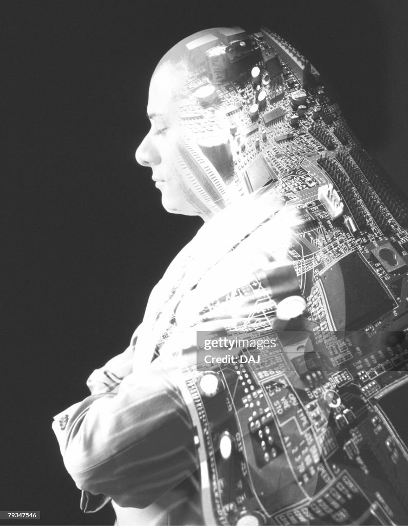 Image of a Man With his Eyes Closed, Folding his Arms, With a Distorted Image of a PCB on his Back, Side View, CG