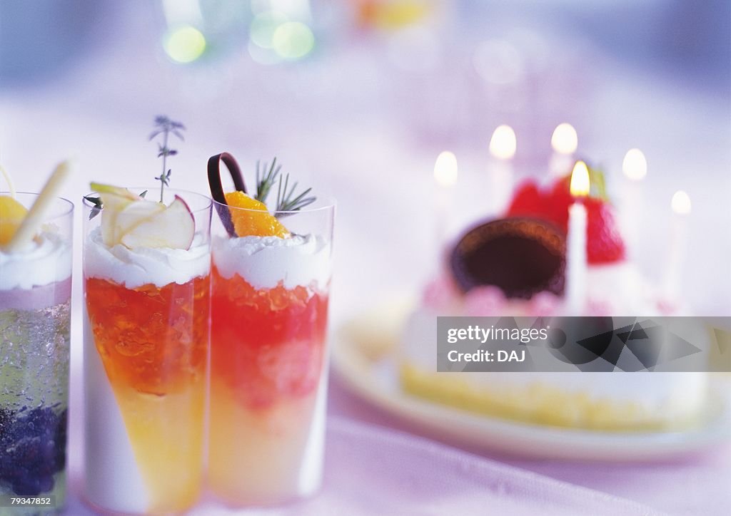 Birthday cake and jelly in glasses