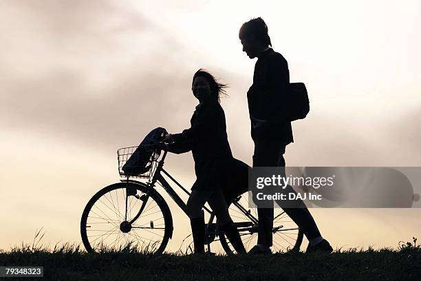 teenage couple - embankment stock pictures, royalty-free photos & images