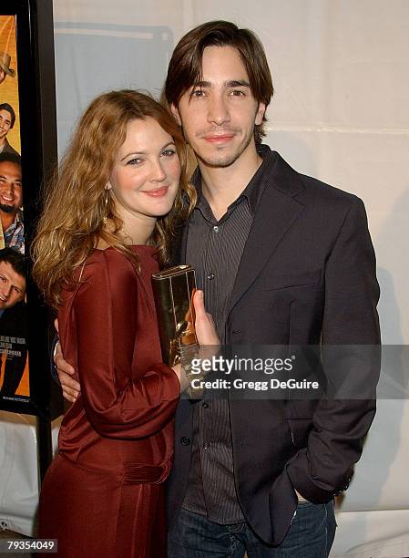 Actress Drew Barrymore and actor Justin Long arrive at "Vince Vaughn's Wild West Comedy Show" Los Angeles premiere at the Egyptian Theatre on January...