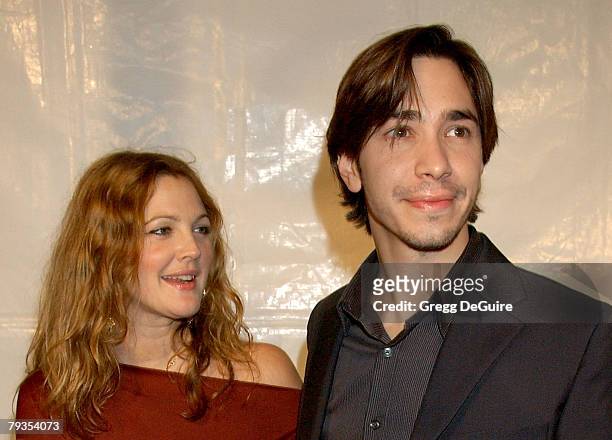 Actress Drew Barrymore and actor Justin Long arrive at "Vince Vaughn's Wild West Comedy Show" Los Angeles premiere at the Egyptian Theatre on January...