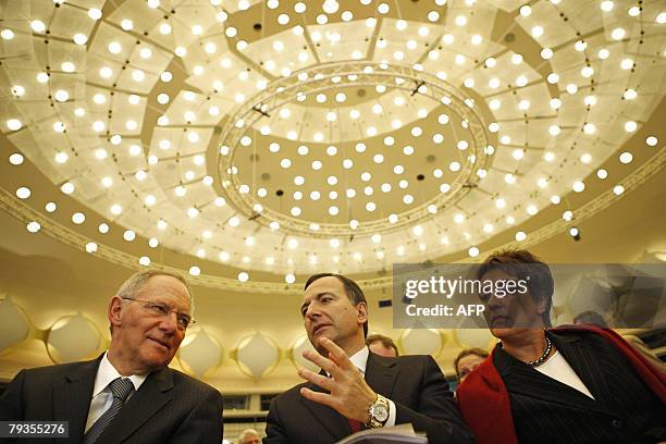 German Interior minister Wolfgang Schaeuble, European Justice Commissioner Franco Frattini and German Justice minister Brigitte Zypries attend the...