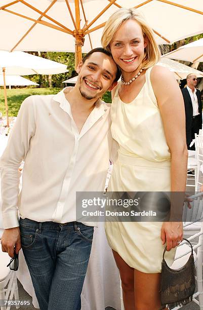 Actress Amber Valletta and Nina Ricci designer Oliver Theyskens inside the "Couture Cares" exclusive Nina Ricci fashion show and luncheon to benefit...