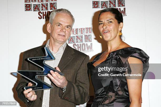 Visual Arts winner Andy Goldsworthy poses with sward presenter artist Tracey Emin during the South Bank Show Awards 2008 at The Dorchester on January...
