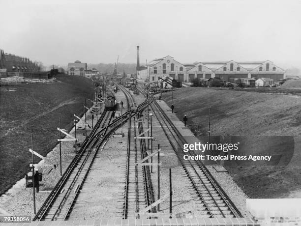 Golders Green tube station under construction in north London, April 1907. The station, completed the following June, was originally on the Charing...