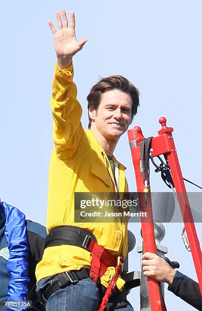Actor Jim Carrey makes a phone call while filmming a live bunjee jump stunt scene off the Arroyo Seco Bridge for his upcomming film comedy the "Yes...