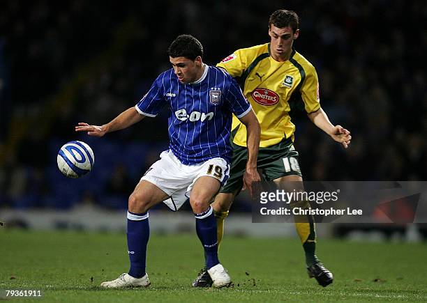 Jonathan Walters of Ipswich battles with Gary Sawyer of Plymouth during the Coca-Cola Championship match between Ipswich Town and Plymouth Argyle at...