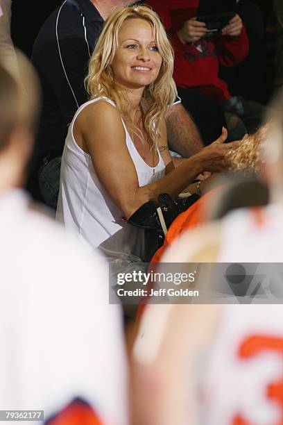 Actress Pamela Anderson attends the basketball game between the Loyola Marymount Lions and the Pepperdine Waves on January 26, 2008 at Firestone...