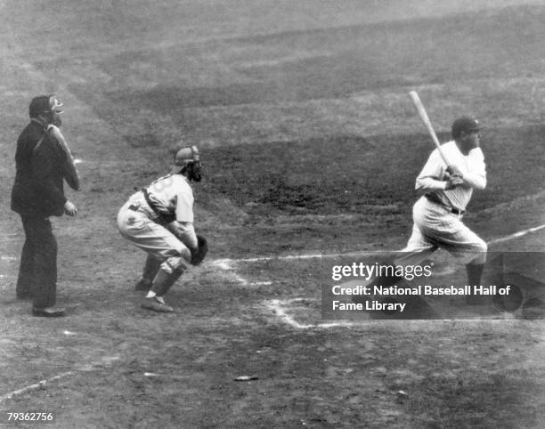 Babe Ruth of the New York Yankees hits his 60th home run of the season against Washington Senators' pitcher Tom Zachary and sets a record that will...