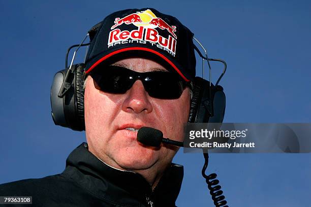 Jay Frye, General Manager of Team Red Bull observes his cars driven by Brian Vickers and AJ Allmendinger from atop of the team transporter during...