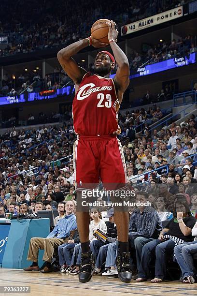 LeBron James of the Cleveland Cavaliers goes up for the shot during the NBA game against the New Orleans Hornets at the New Orleans Arena on December...