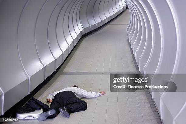 Passes Out Person Passed Out In Office Photos and Premium High Res Pictures ...