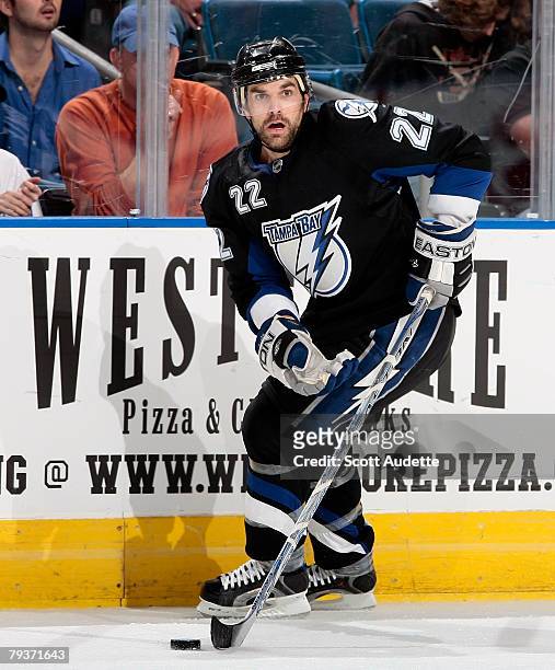 Dan Boyle of the Tampa Bay Lightning looks to pass the puck against the Buffalo Sabres at St. Pete Times Forum January 29, 2008 in Tampa, Florida.