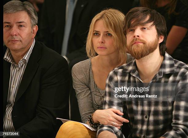 Berlin's mayor Klaus Wowereit, model Eva Padberg and Niklas Worgt attend the Michalsky fashion show during the Mercedes-Benz Fashionweek Berlin...