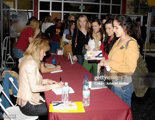 Paige Adams Geller signs copies of her book "Your Perfect Fit" by Paige Adams-Geller and Ashley Borden at the Annenberg Auditorium on the campus of...