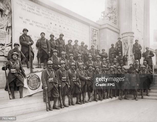 French soldiers at the Altar of Liberty, a temporary structure, bearing quotations from President Woodrow Wilson, in Madison Square, New York,...