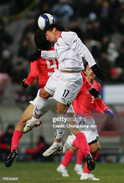 Gary Medel of Chile and Kim Nam-Il of South Korea in action during the International friendly match between South Korea and Chile at SangAm Stadium...