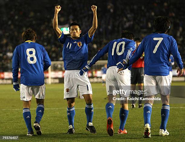 Koji Yamase, Ryuji Bando, Yasuhito Endo and Naotake Hanyu of Japan celebrate after scoring a goal against Bosnia during international friendly match...