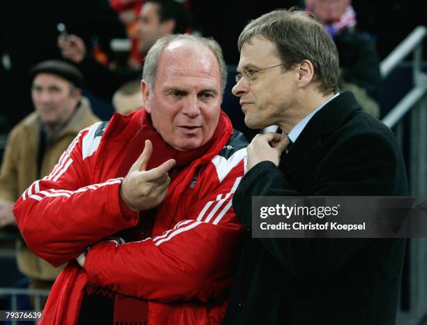 Manager Uli Hoeness of Bayern talks to managing director Peter Peters of Schalke before the DFB Cup round of 16 match between Wuppertaler SV and...