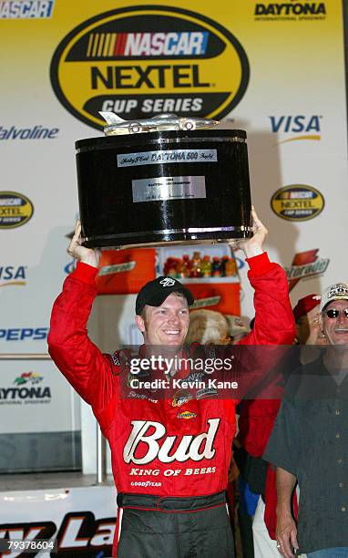 Dale Earnhardt Jr. Holds the trophy after winning the Daytona 500 at Daytona International Speedway, February 18, 2004.