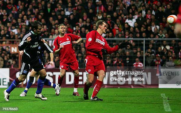 Rafael van der Vaart of Hamburg heads the first goal during the DFB Cup Round of 16 match between Rot-Weiss Essen and Hamburger SV at...