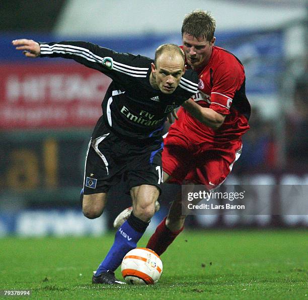 David Jarolim of Hamburg in action with Michael Lorenz of Essen during the DFB Cup Round of 16 match between Rot-Weiss Essen and Hamburger SV at...