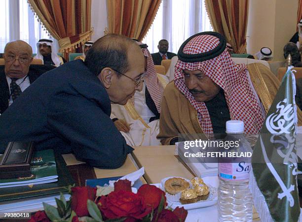 Saudi Interior Minister Prince Nayef bin Abdul Aziz al-Saud speaks with his Algerian counterpart Noureddine Yazid Zerhouni 30 January 2008 during the...