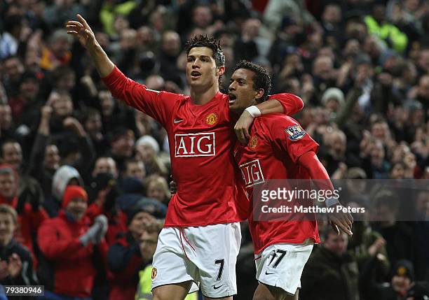 Cristiano Ronaldo of Manchester United celebrates scoring his team's first goal during the Barclays FA Premier League match between Manchester United...