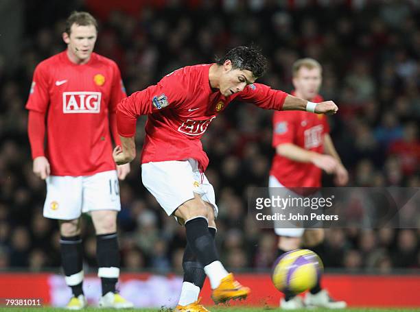 Cristiano Ronaldo of Manchester United scores his team's second goal during the Barclays FA Premier League match between Manchester United and...