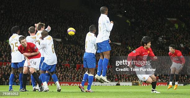 Cristiano Ronaldo of Manchester United scores their second goal during the Barclays FA Premier League match between Manchester United and Portsmouth...