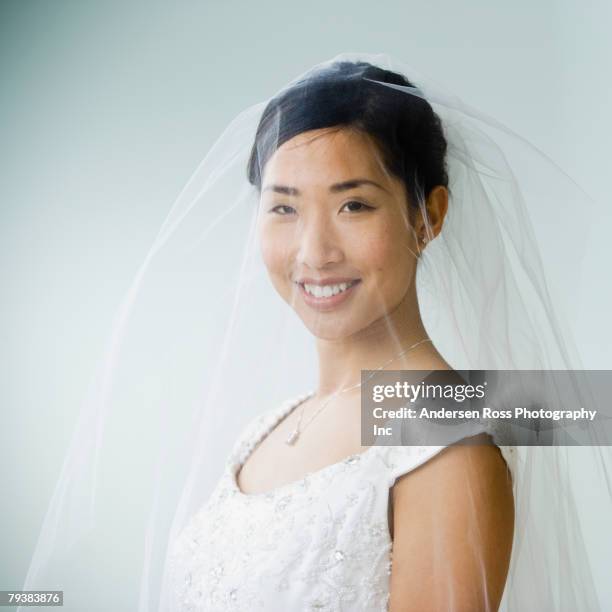 asian bride wearing veil - veil isolated stock pictures, royalty-free photos & images