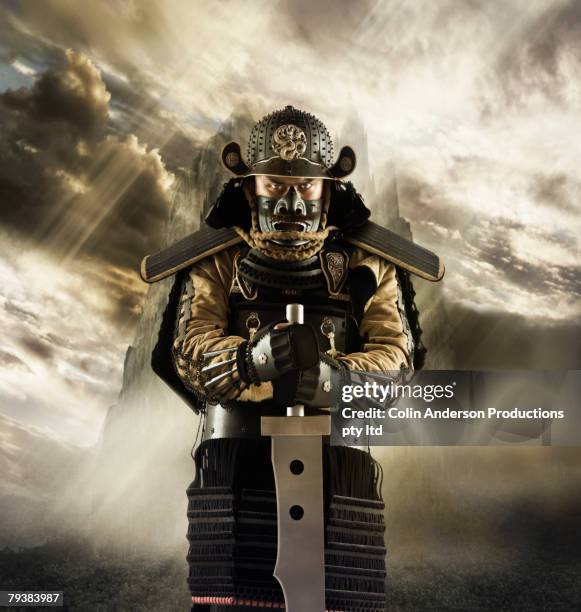 asian man in samurai armor - samurai stock pictures, royalty-free photos & images