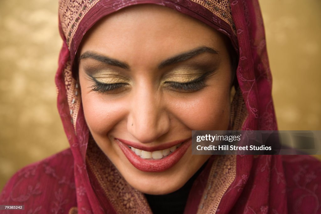 Middle Eastern woman laughing