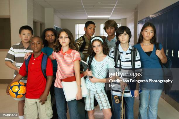 group of multi-ethnic students in hallway - boy girl stockfoto's en -beelden