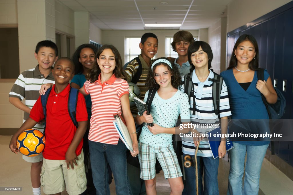 Group of multi-ethnic students in hallway