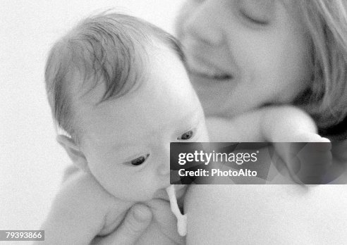 Mother holding baby Mother holding baby