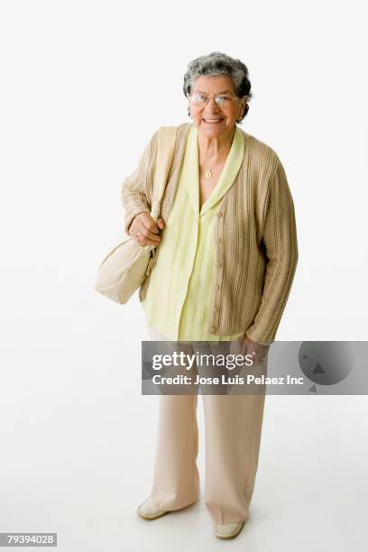 high angle view of senior hispanic woman - elevated view of person on white background stock pictures, royalty-free photos & images