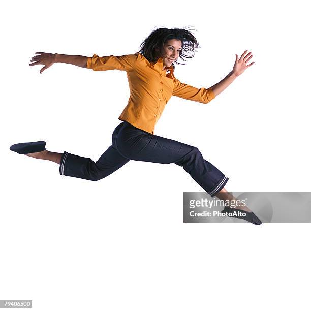 woman jumping - running legs stock pictures, royalty-free photos & images