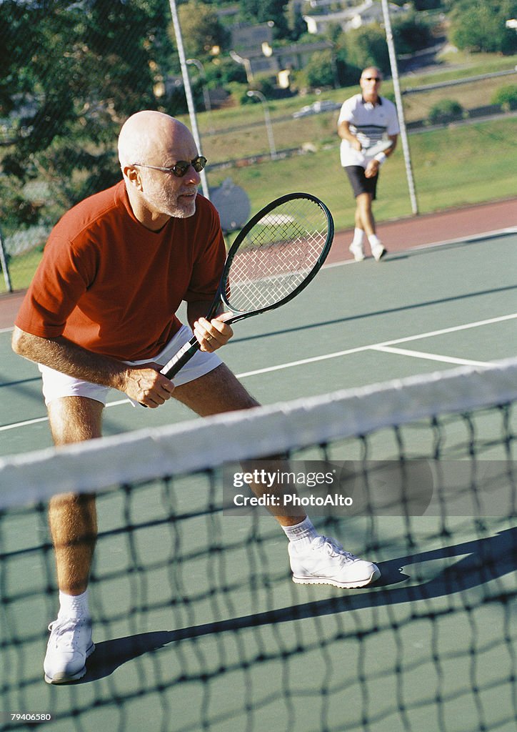 Mature tennis player