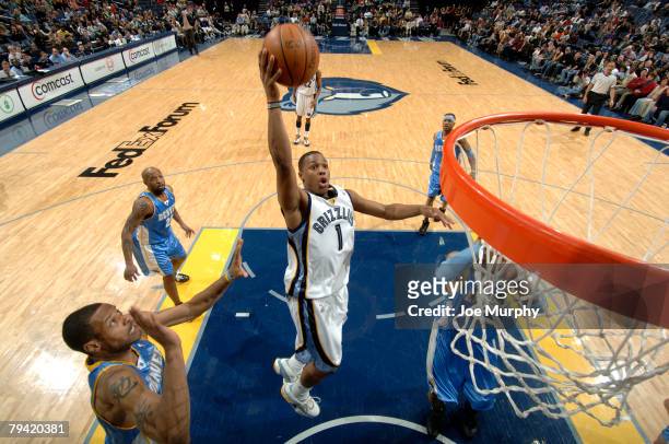 Kyle Lowry of the Memphis Grizzlies shoots a layup in a game against the Denver Nuggets on January 30, 2008 at the FedExForum in Memphis, Tennessee....