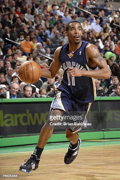 Mike Conley of the Memphis Grizzlies moves the ball during the NBA game against the Boston Celtics at the TD Banknorth Garden on January 4, 2008 in...
