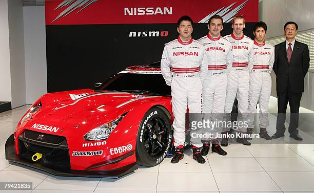 Drivers Satoshi Motoyama, Senoit Treluyer, Michael Krumm, Masataka Yanagida and manager Yoshitaka Iijima pose in front of Nissan's No.23 Xanavi Nismo...