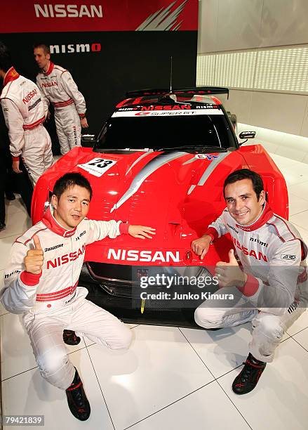 Drivers Satoshi Motoyama and Senoit Treluyer pose in front of Nissan's No.23 Xanavi Nismo GT-R during the Nissan 2008 Motorsports Activities press...